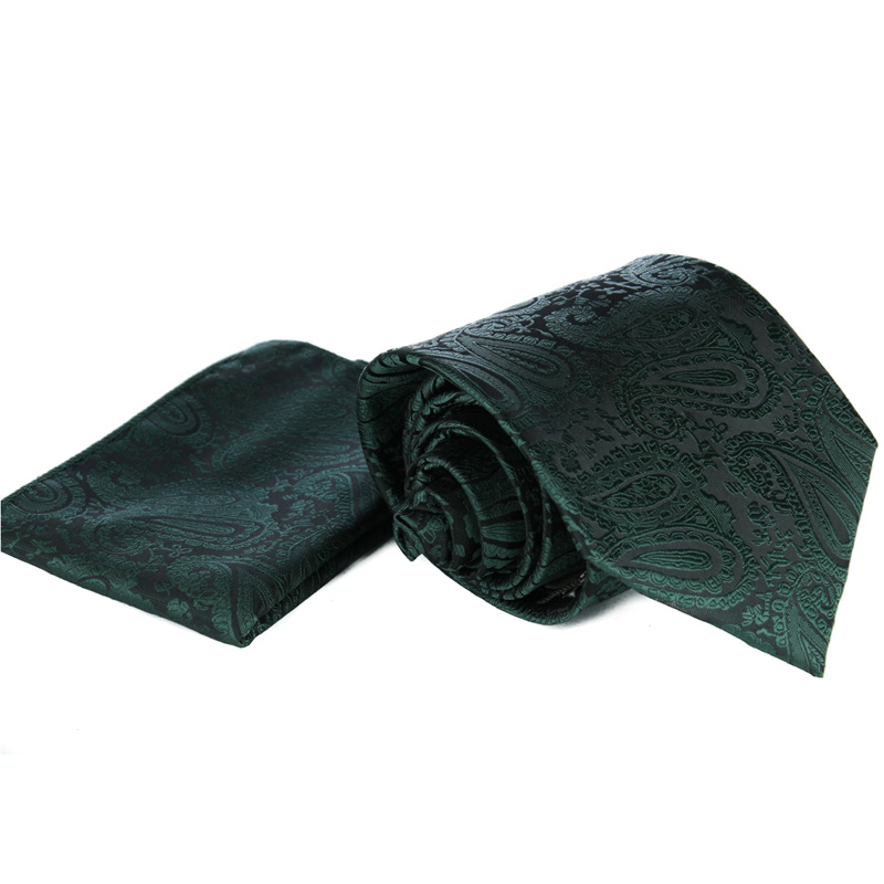 Anyagában virágmintás, sötét zöld nyakkendő díszzsebkendővel