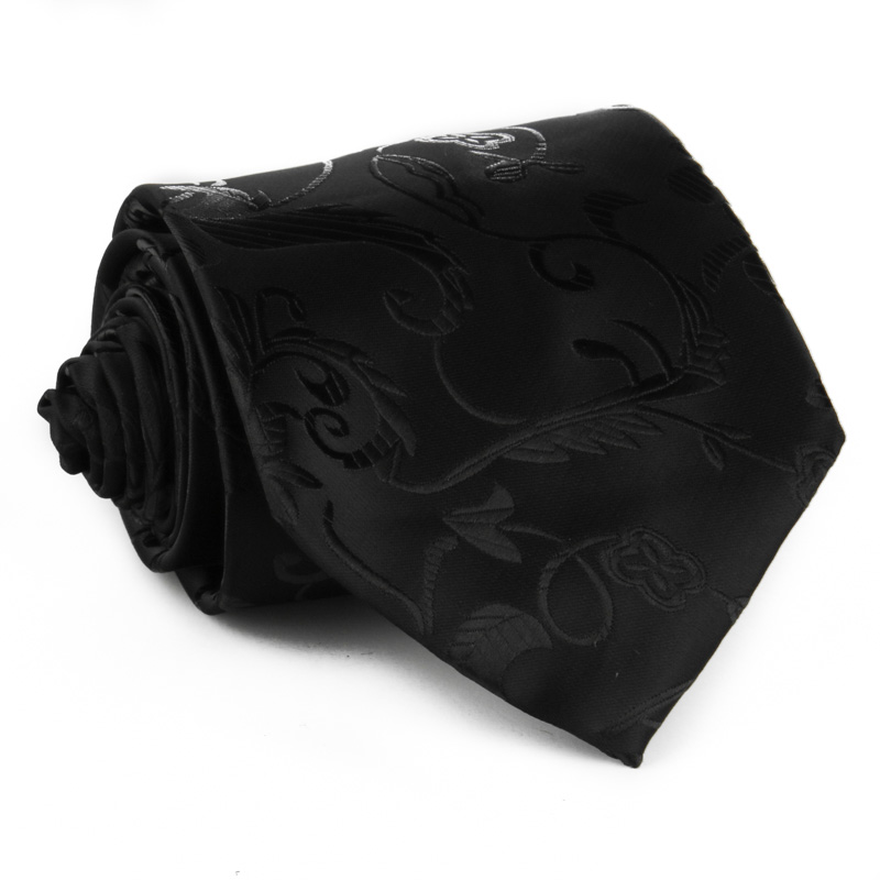 Anyagában mintás, fekete nyakkendő díszzsebkendővel