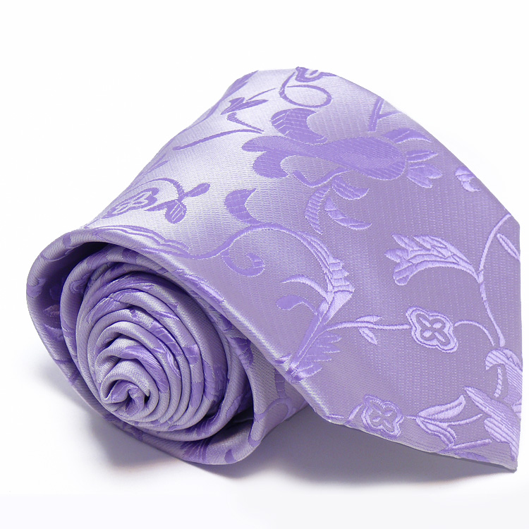 Anyagában mintás, lila nyakkendő díszzsebkendővel