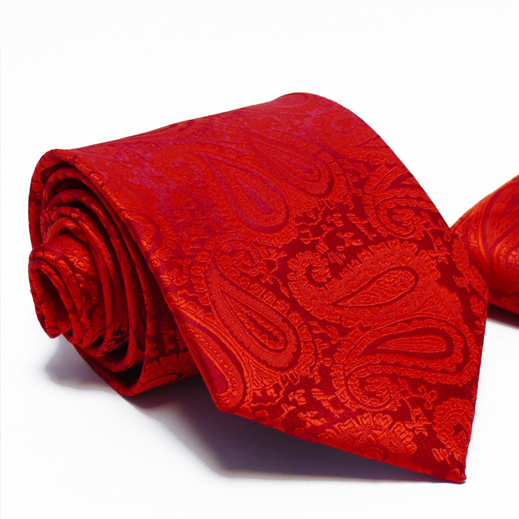 Anyagában virágmintás, sötét piros nyakkendő díszzsebkendővel